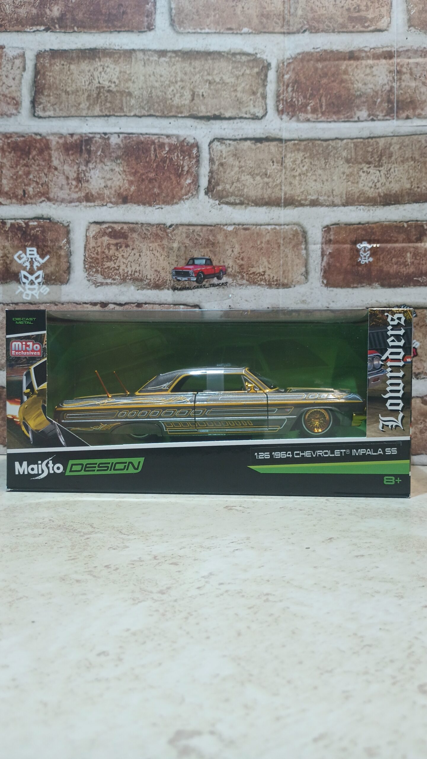 1964 Chevrolet Impala SS Lowrider Gray Metallic with Gold Graphics "Lowriders" "Maisto Design" 1/26 Diecast Model Car by Maisto